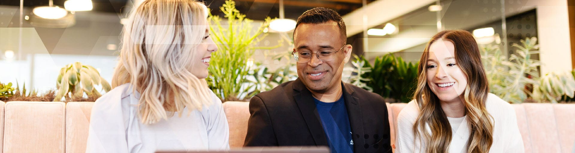 ASU alumn and entrepreneur Shannon Gilpin of Nonnahs Marketing with her core team at Industrious Tempe, a co-working space.