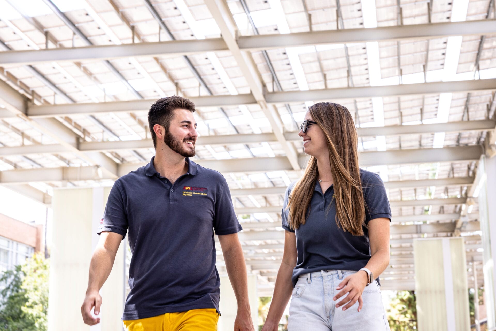 ASU School of Sustainability students conducting work driving climate solutions under solar panels