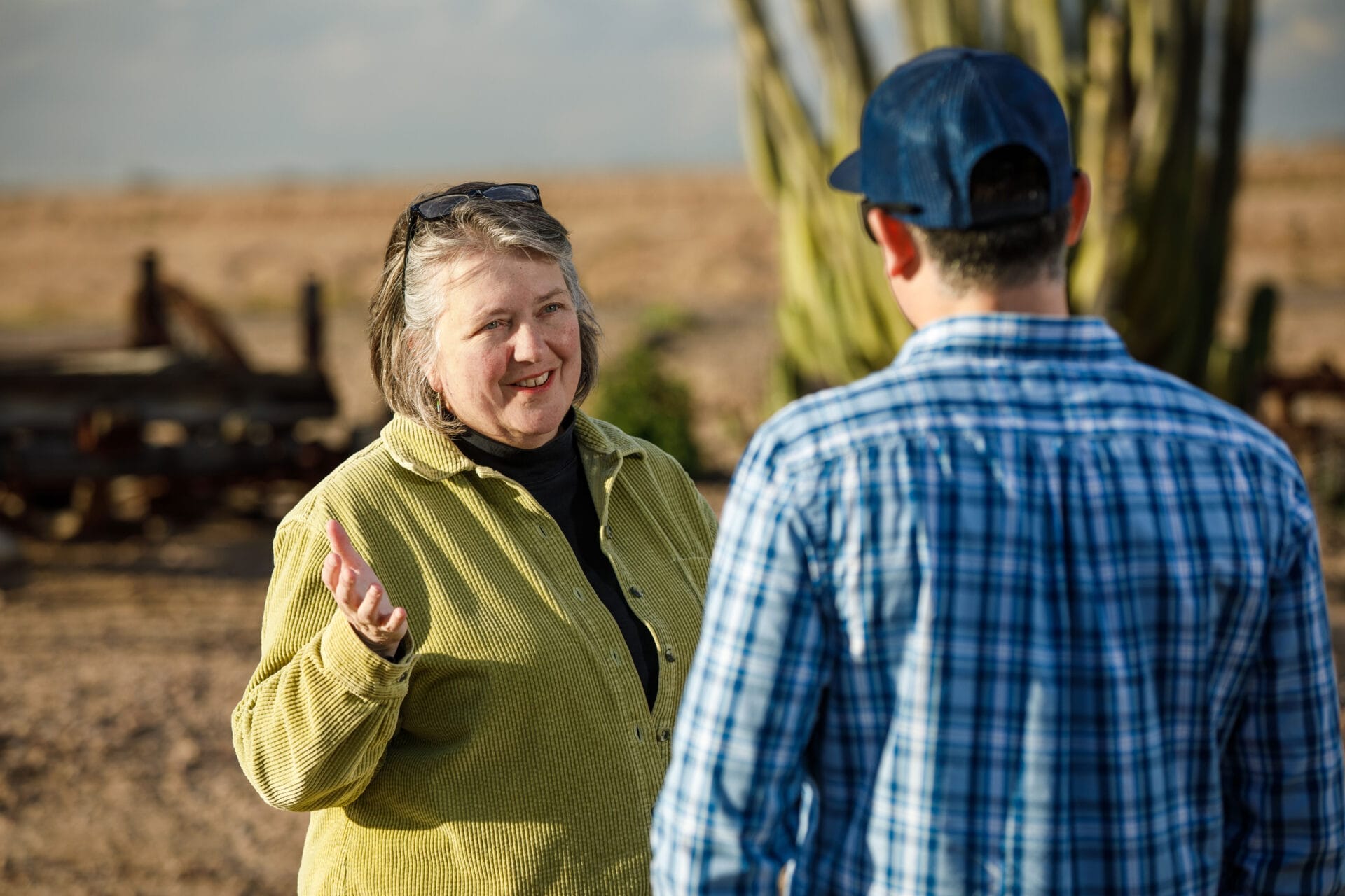 ASU director of sustainable food systems Kathleen Merrigan working in the field